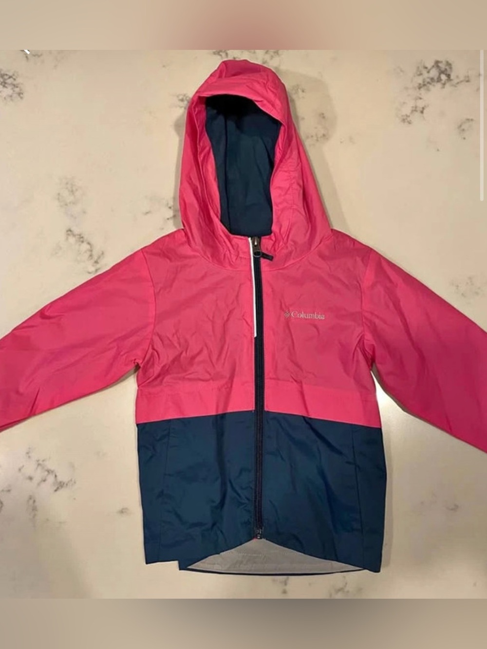Columbia Girls' Rain-Zilla II Jacket in a pink and navy blue color block
